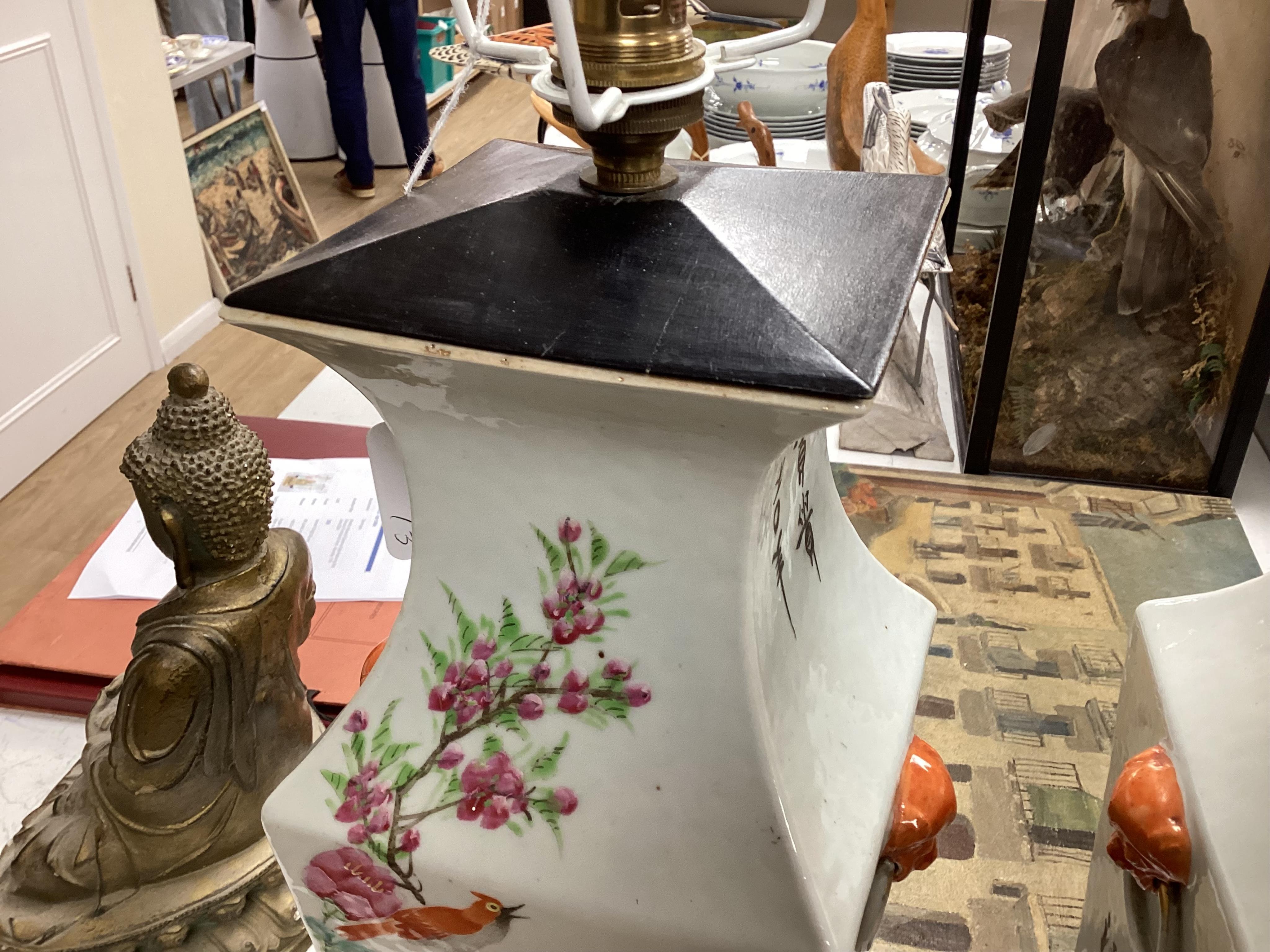 A pair of early 20th century Chinese famille rose vases, mounted as lamps and a plaster model of a Buddha, vases 46cm